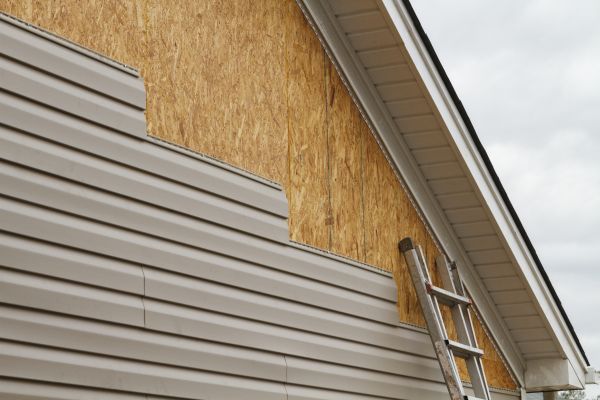 Grey Vinyl Siding Installation in Eden Prairie
